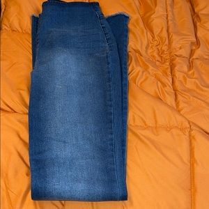 Flare high elastic waisted distressed jeans.